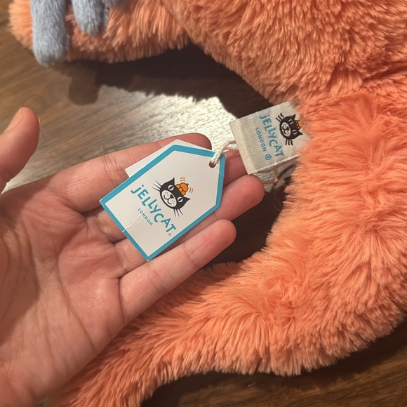 Jellycat Orange Plush Dinosaur - Picture 2 of 4